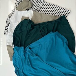 Assorted T-Shirts in Blue, Green, and Stripes